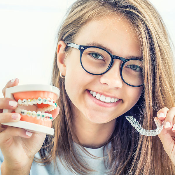 Girl showcasing braces options